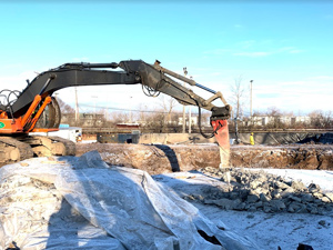 December 2019 - View looking north: Concrete in tank is broken up with the hydraulic hammer. 